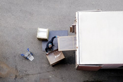Moving crew loading household items for Childshill relocation