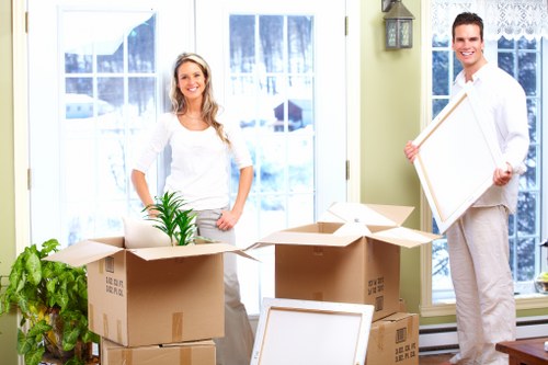 Packed moving items and furniture ready for a removals van job