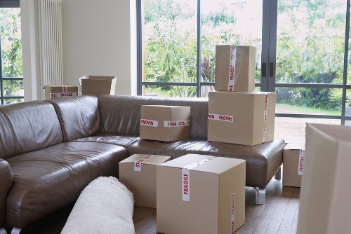Local office movers handling desks and equipment in a Childshill relocation