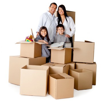 Professional movers carrying household items through a residential property